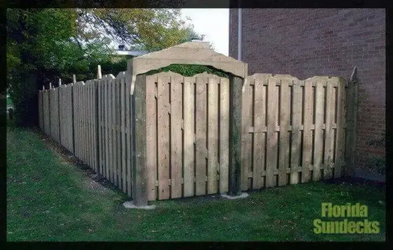 Treated Wood Fence with design door in Hudson fence in Hudson